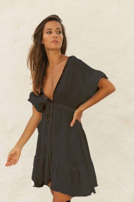 Vestido QAMAR corto en batista de algodón 100% color negro con estampado en puntitos dorados.